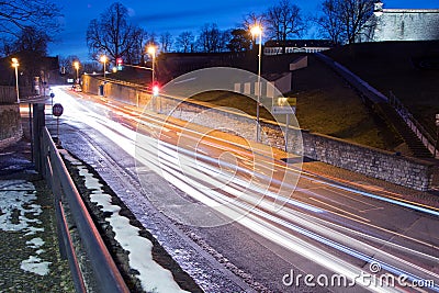 Road in Erfurt at night with car lights and lantern Stock Photo