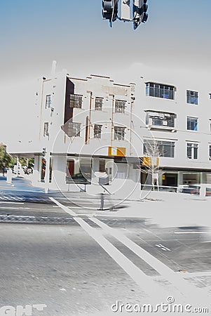 Road explosion with flash of light and moving cars near a crossroad. Roadside bombing Editorial Stock Photo