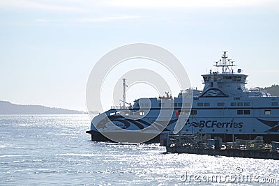 The road by ferry to Victoria from Vancouver beautiful ocean water sun reflections Travel agency trip to Vancouver Editorial Stock Photo
