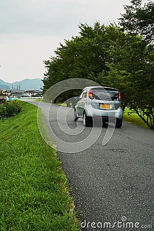 A road fulfills with Sakura tree in Yamaguchi City, Japan. Stock Photo