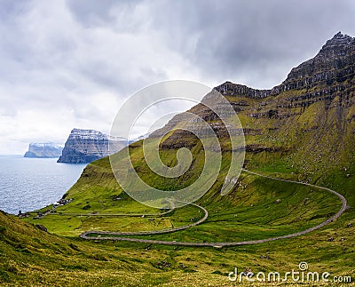 Road going to Trollanes village on Kalsoy in Faroe Islands, Denmark Stock Photo