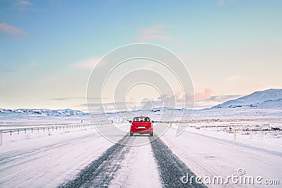 Road on the golden ring of Iceland. Traveling by car in Europe. Winter holidays in Iceland. Mountains and snow Stock Photo