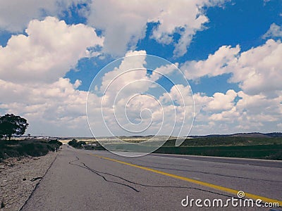 road horizon sky lanfield clouds village field Stock Photo