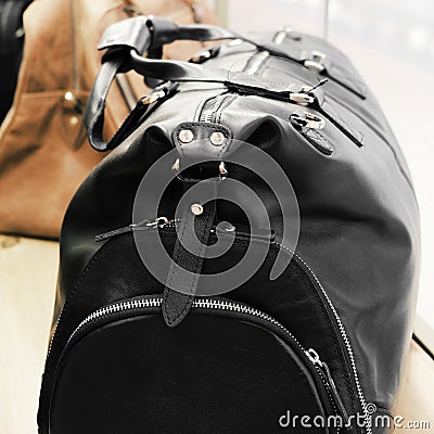 Road leather bag. Luxury travel. Casual style, beauty accessories. Beauty model. Retro style. Stock Photo