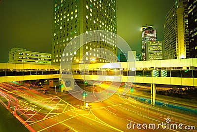 Road light trails on streetscape buildings backgrounds in HongKong Stock Photo