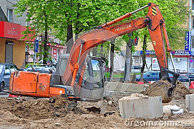Hitachi Excavator. Road Maintenance Works in Russia. Editorial Stock Photo