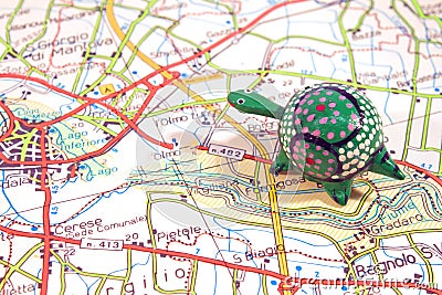 Road map with toy turtle Stock Photo