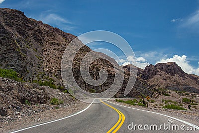 A road in the middle of the colorful Andes Mountain Range. Stock Photo