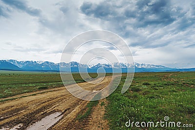 Road in a mountainous desert in the summer Stock Photo