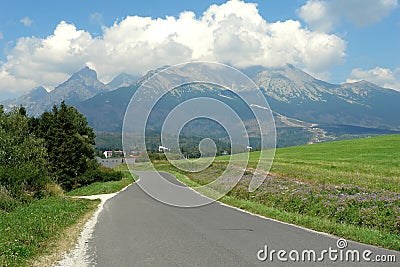 Road, mountains and clouds in Slovakia. Stock Photo