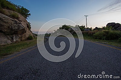 A newly constructed road with clean bright sky Stock Photo