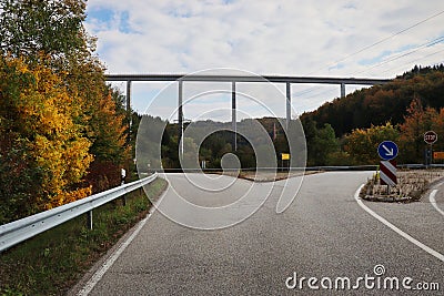 Road next to colorful fall leaves Editorial Stock Photo
