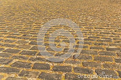 Road with old and typically paved for cars. Colonia de sacramento street, old Portuguese city in Uruguay Stock Photo