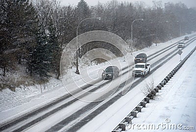 Road with poor visibility in a blizzard Stock Photo