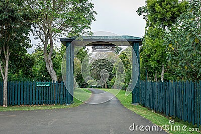 Road with portal and signs towards Mountain lodges in Mount kenya in Africa. Editorial Stock Photo