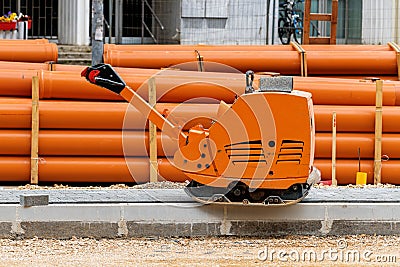 Road rammer machine on construction site Stock Photo