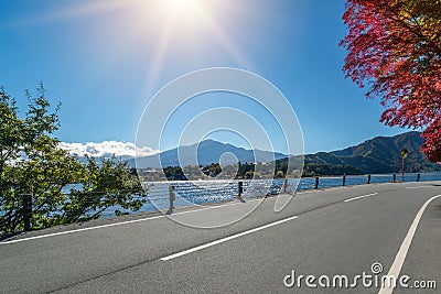 Road Scenery with Lake and Mountain Landscape Stock Photo