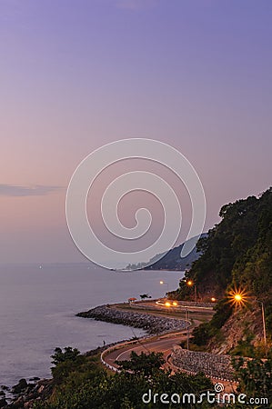 Road beside the sea in sunset ,Nang Phaya View Point ,Chanthaburi, Thailand. Stock Photo