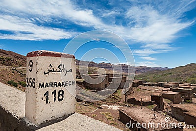 Road Sign along the road between Marrakesh and Ouarzate in the small town of Inkkal, High Atlas, Morocco Stock Photo