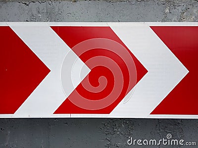 Road sign, arrow, pointer, icon. Metaphor and symbol of movement and development. Stock Photo