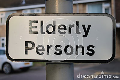 Road sign Elderly Persons taken outside a care home UK Stock Photo