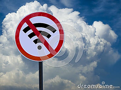 Road sign no wifi on sky background with clouds. Stock Photo