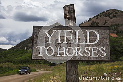 Road sign saying Yield to Horses, Colorado, USA Stock Photo