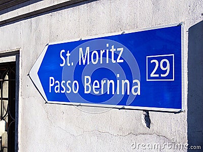 Road sign for St. Moritz and Passo Bernina in Switzerland Editorial Stock Photo