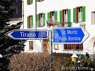 Road sign for St. Moritz, Passo Bernina and Tirano Editorial Stock Photo
