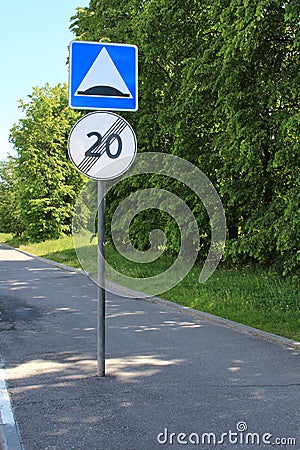 Road sign uneven road Stock Photo