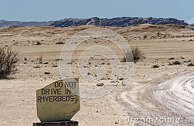 Road sign in Namibian desert Stock Photo