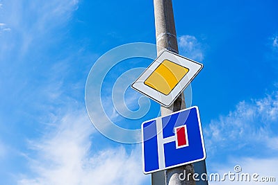 Road Signs Main Road sign and No Turn Allowed Stock Photo