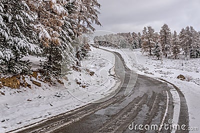 Road snow mountains forest autumn snowy Stock Photo