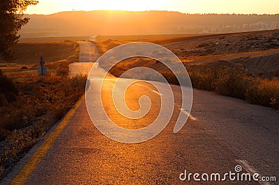 Road at sunset Stock Photo