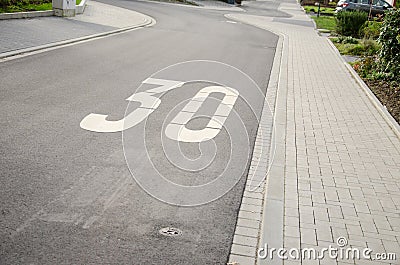 Road surface marking 30 km/h zone Stock Photo