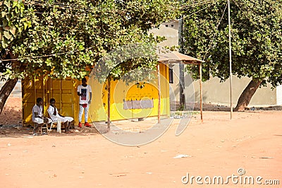 Unidentified local three boys locate near the garage in a villa Editorial Stock Photo