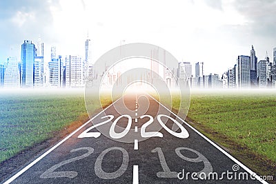 Road to city with 2020 and 2019 written on it Stock Photo