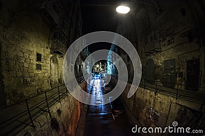 The road to darkness in the city of Valletta. Malta. Stock Photo