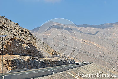 Road to Ras Al Khaimah Jebel Jais Mountain Cloud Shadows Stock Photo