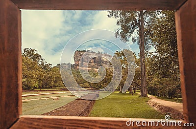 Road to Sigiriya mountain and people walking to famous historical and archaeological site. UNESCO world heritage area Stock Photo