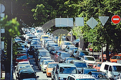 Road traffic, congestion on a city road. A car with a high load. The problem of urban infrastructure Editorial Stock Photo