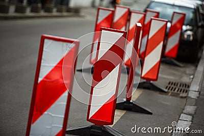 Road traffic works safety pole post obstacle detour sign barrier Stock Photo