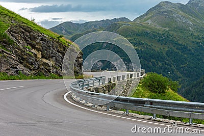Road Turn in Mountains Stock Photo