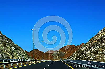 Road view in Sharjah Kalba road with Road Direction Sign Board Stock Photo