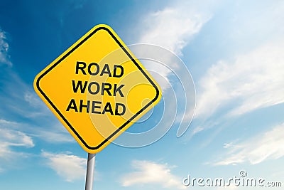 Road work ahead road sign with blue sky and cloud background Stock Photo