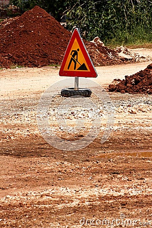 Road works sign for construction works, road, pavement construction. Traffic, warning sign road repairing, road maintenance. Stock Photo