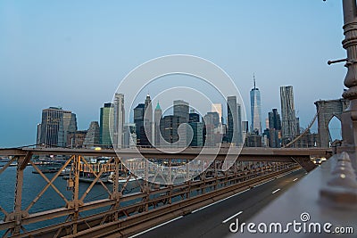 Roadbed of the Brooklyn Bridge with New York skyscrapers in the background Stock Photo