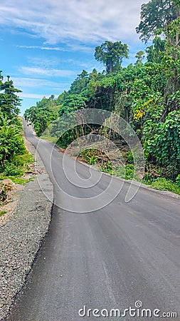 Roads built in West Papua Province that connect villages really help local communities access transportation Stock Photo