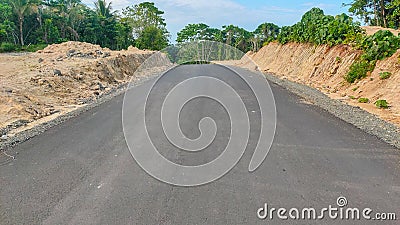 Roads built in West Papua Province that connect villages really help local communities access transportation Stock Photo