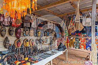 Roadside arts dealer along a street in Yamoussoukro Ivory Coast Cote d`Ivoire West Africa. Stock Photo